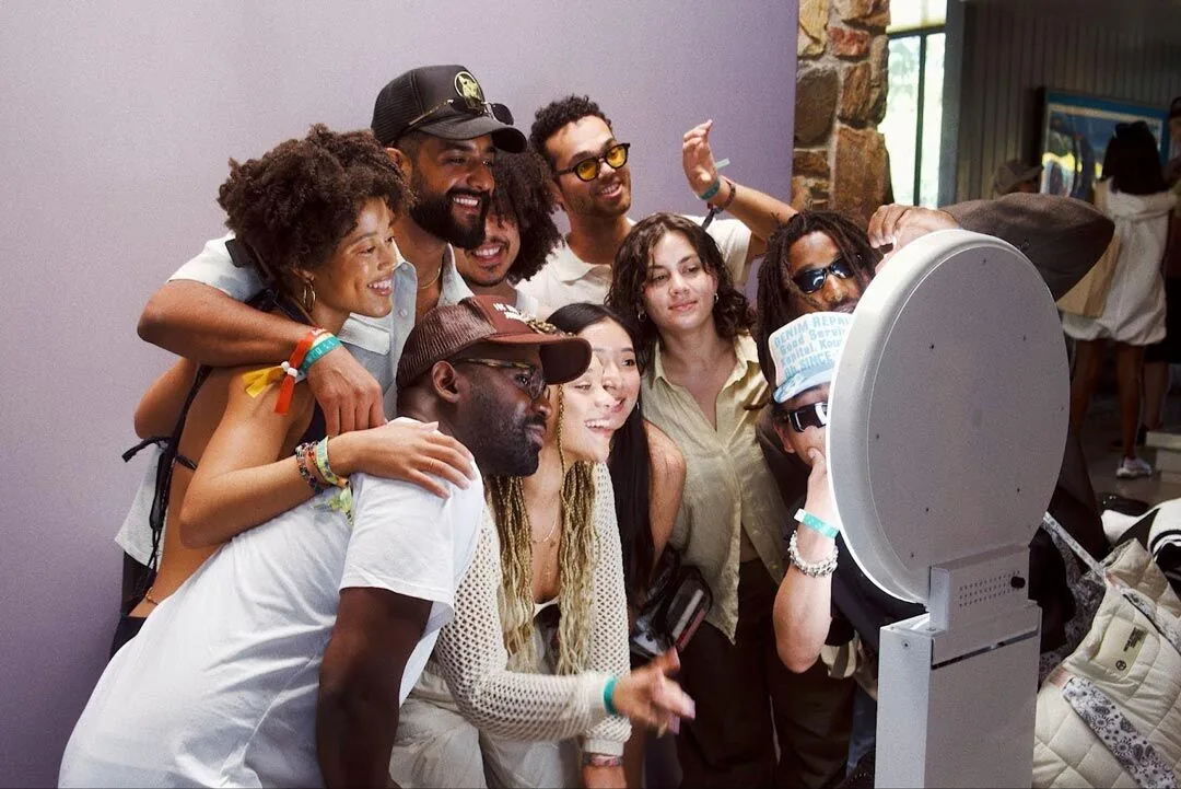 Friends posing together for an event photo booth portrait